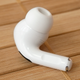 The left Apple AirPods Pro 2nd Generation earbud.